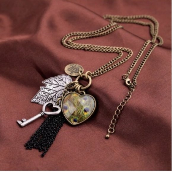LiveChicStyle Jewelry - Yellow Peacock Heart Key Antique Gold Sweater Necklace